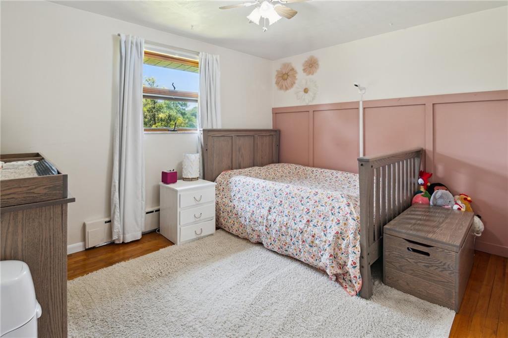 1343 Venetia Road Eighty Four, PA 15330 - Photo 17 of 27 a bedroom with a bed and a window