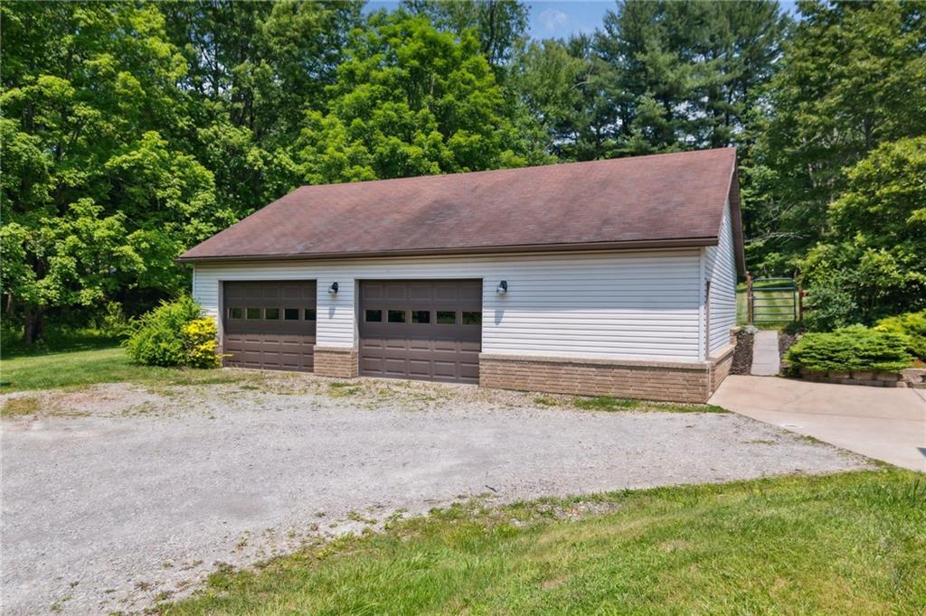 1343 Venetia Road Eighty Four, PA 15330 - Photo 3 of 27 a house with a yard