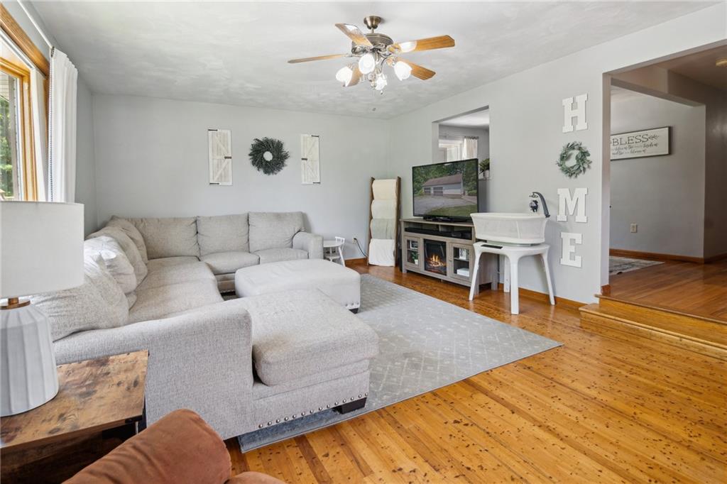 1343 Venetia Road Eighty Four, PA 15330 - Photo 6 of 27 a living room with furniture and a flat screen tv