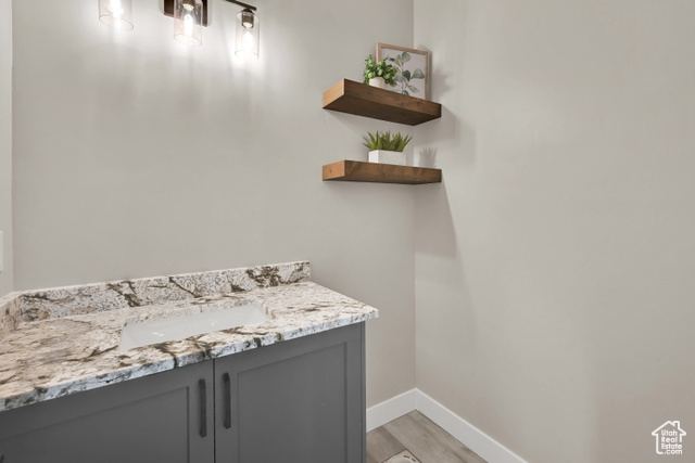 658 West 500 South Logan, UT 84321 - Photo 3 of 25 Bathroom with vanity and light wood-style floors