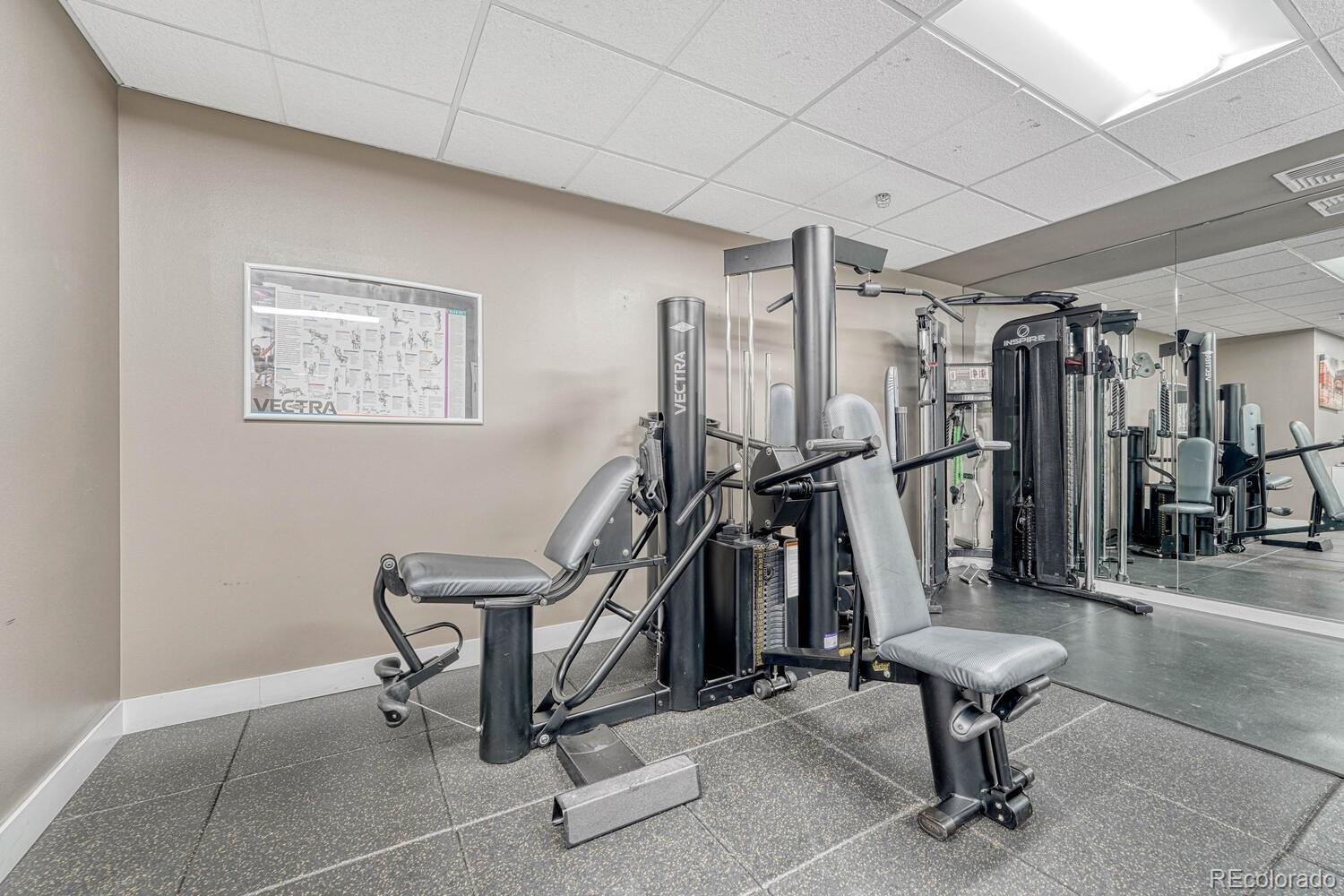 1975 Grant Street, Unit 509 Denver, CO 80203 - Photo 27 of 30 a view of a room with gym equipment