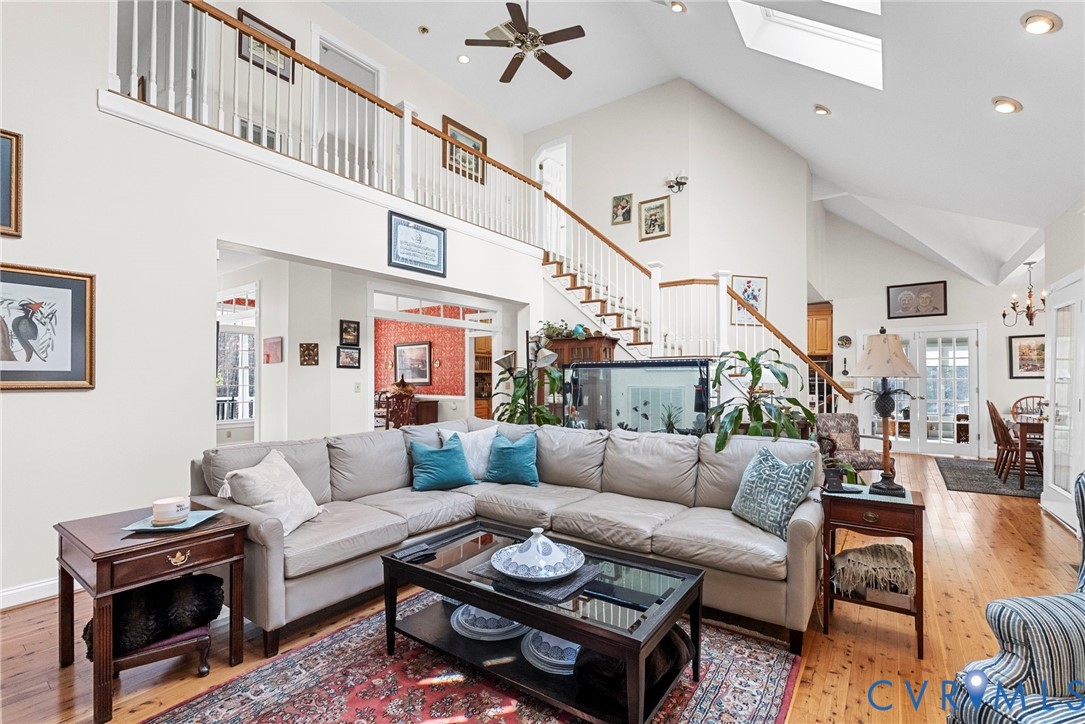 13300 Old Telegraph Road Providence Forge, VA 23140 - Photo 11 of 46 a living room with furniture a rug and a ceiling fan