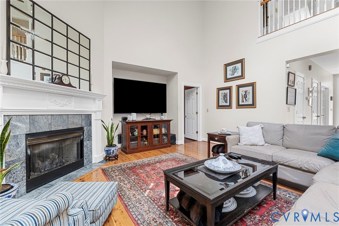 13300 Old Telegraph Road Providence Forge, VA 23140 - Photo 13 of 46 a living room with furniture a flat screen tv and a fireplace