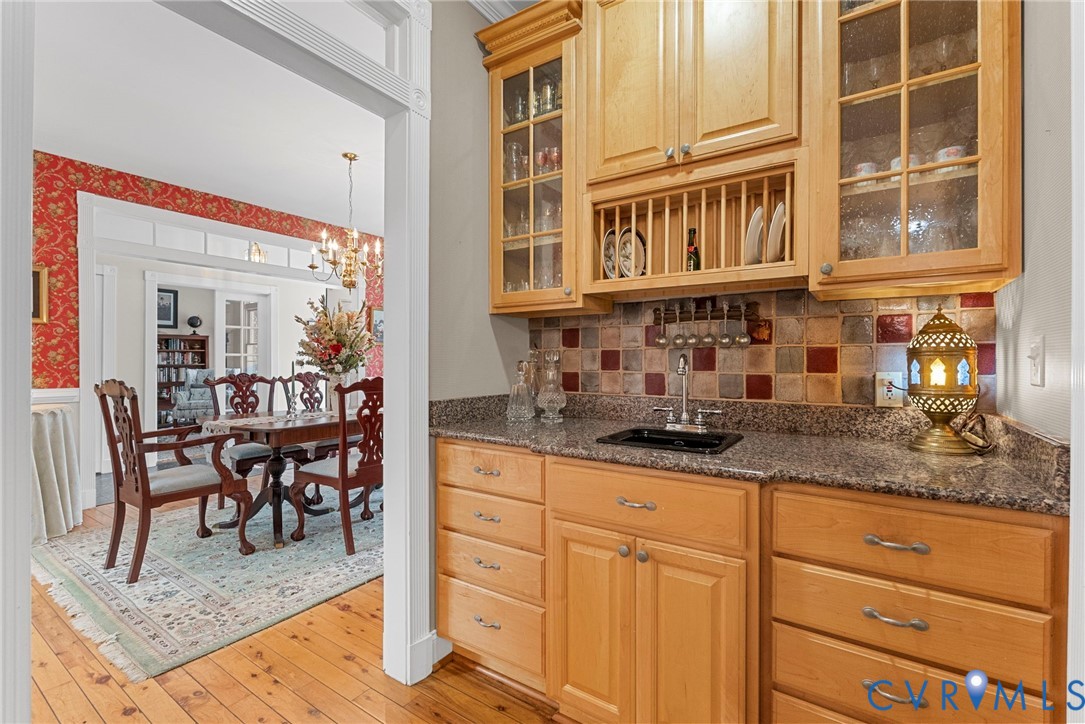 13300 Old Telegraph Road Providence Forge, VA 23140 - Photo 17 of 46 a kitchen with granite countertop a sink and cabinets