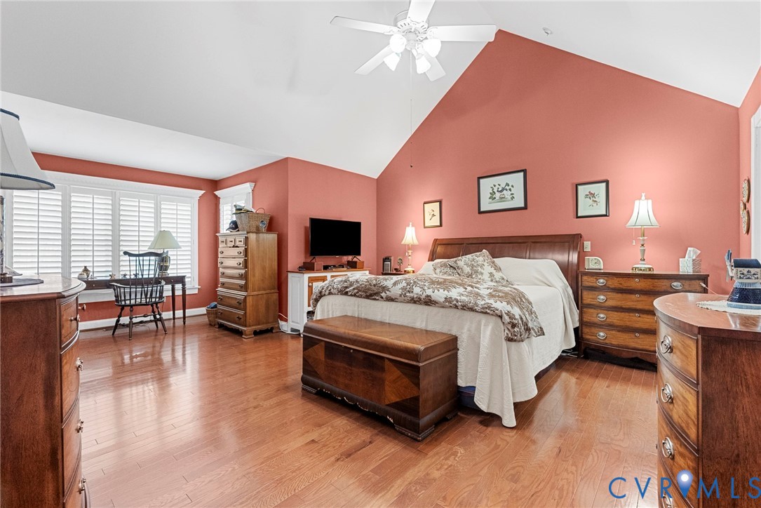 13300 Old Telegraph Road Providence Forge, VA 23140 - Photo 22 of 46 a spacious bedroom with a bed and a table chair