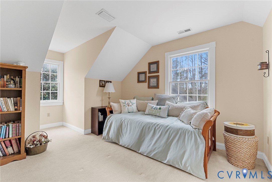 13300 Old Telegraph Road Providence Forge, VA 23140 - Photo 29 of 46 a bedroom with a bed and a window