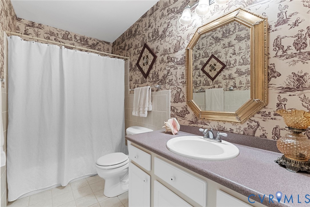 13300 Old Telegraph Road Providence Forge, VA 23140 - Photo 30 of 46 a bathroom with a sink toilet and shower