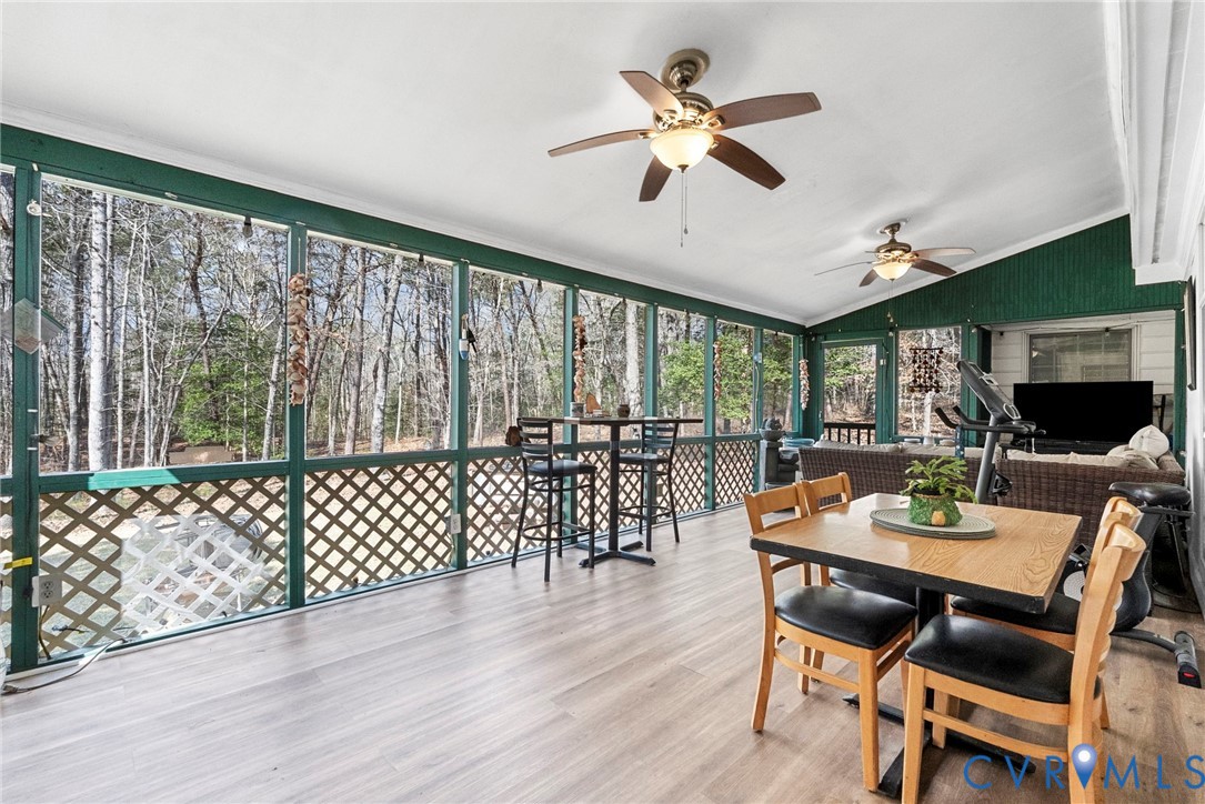 13300 Old Telegraph Road Providence Forge, VA 23140 - Photo 35 of 46 a view of a dining room with furniture window and wooden floor