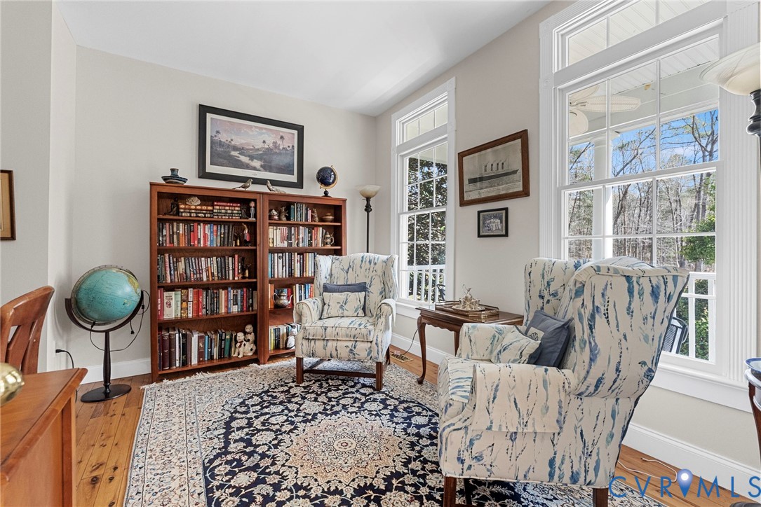 13300 Old Telegraph Road Providence Forge, VA 23140 - Photo 9 of 46 a living room with furniture and a book shelf