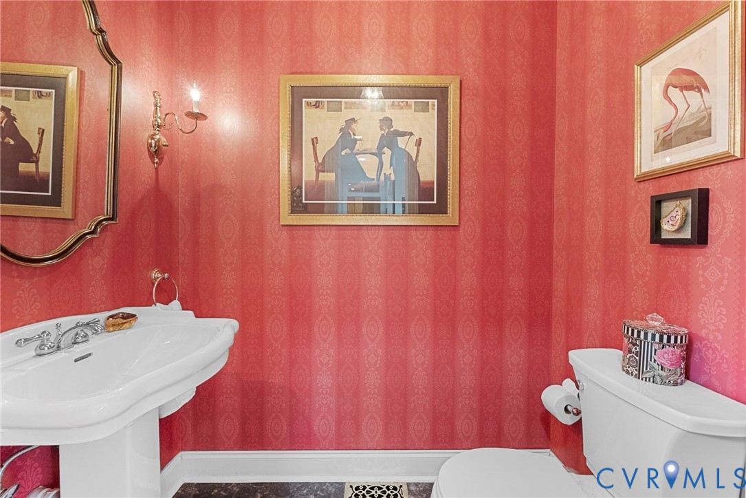 13300 Old Telegraph Road Providence Forge, VA 23140 - Photo 10 of 46 a bathroom with a sink a toilet and shower curtain