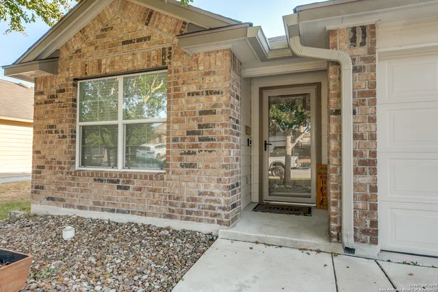 a backyard of a house with seating space