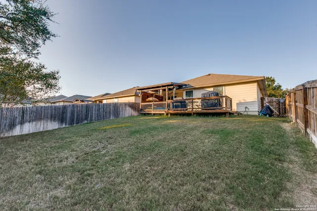 a view of a balcony with chairs