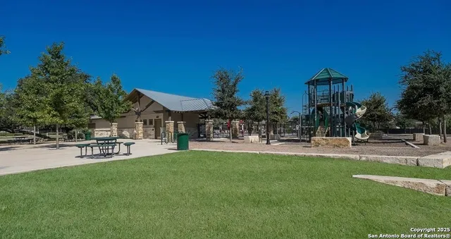 a view of a swimming pool with a lounge chairs