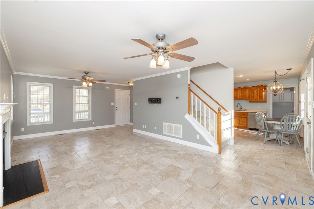 15619 Devlin Drive Chesterfield, VA 23838 - Photo 11 of 46 a view of a livingroom with a ceiling fan and window