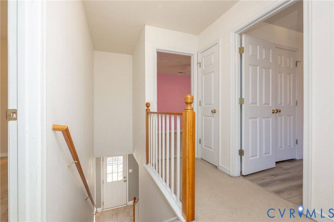 15619 Devlin Drive Chesterfield, VA 23838 - Photo 20 of 46 a view of a hallway with wooden floor and entryway