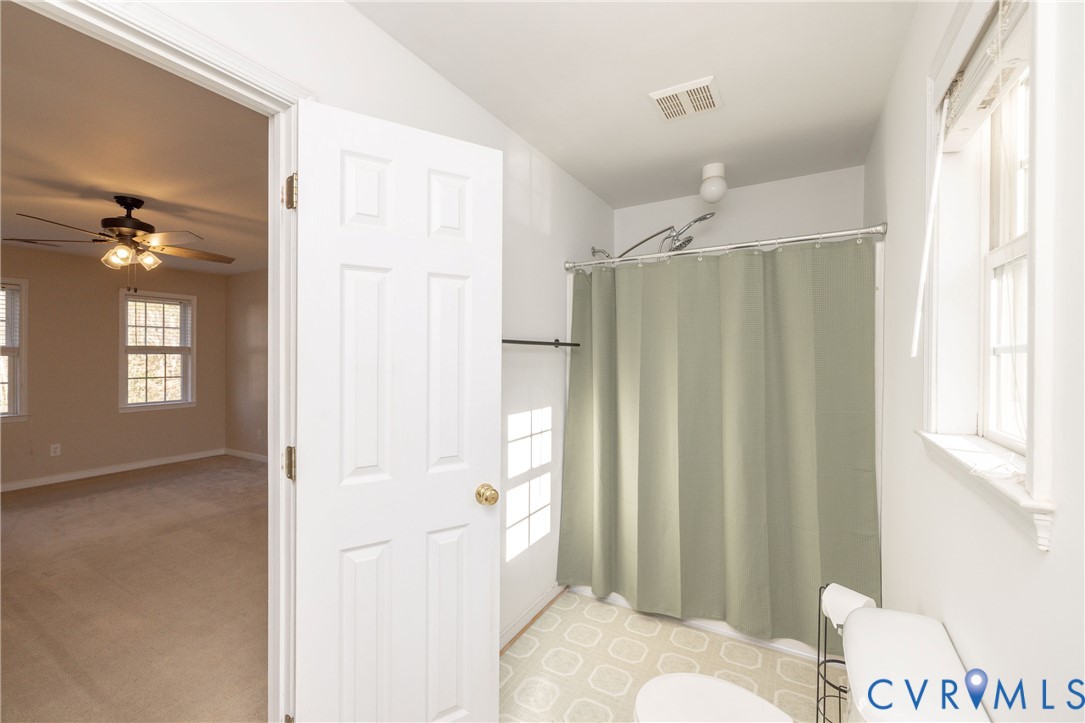 15619 Devlin Drive Chesterfield, VA 23838 - Photo 25 of 46 a bathroom with a shower and a toilet