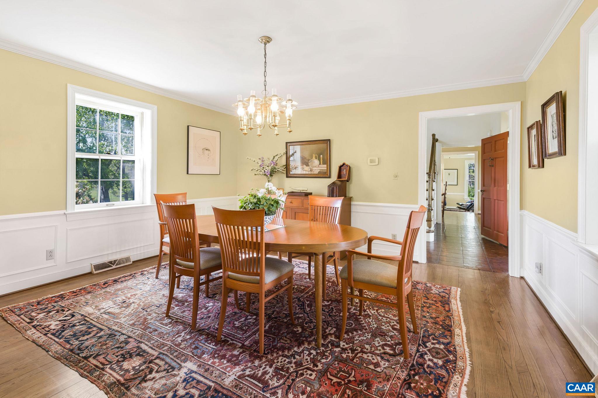 2176 Lindsay Road Gordonsville, VA 22942 - Photo 18 of 70 a view of a dining room with furniture wooden floor and chandelier