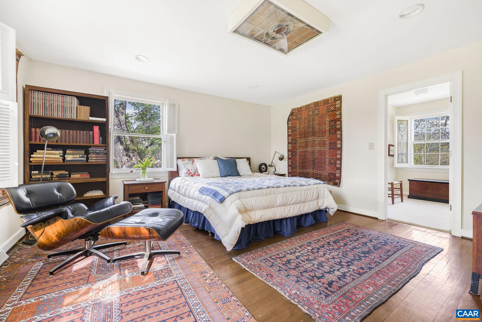 2176 Lindsay Road Gordonsville, VA 22942 - Photo 28 of 70 a bedroom with a bed a couch and a dresser