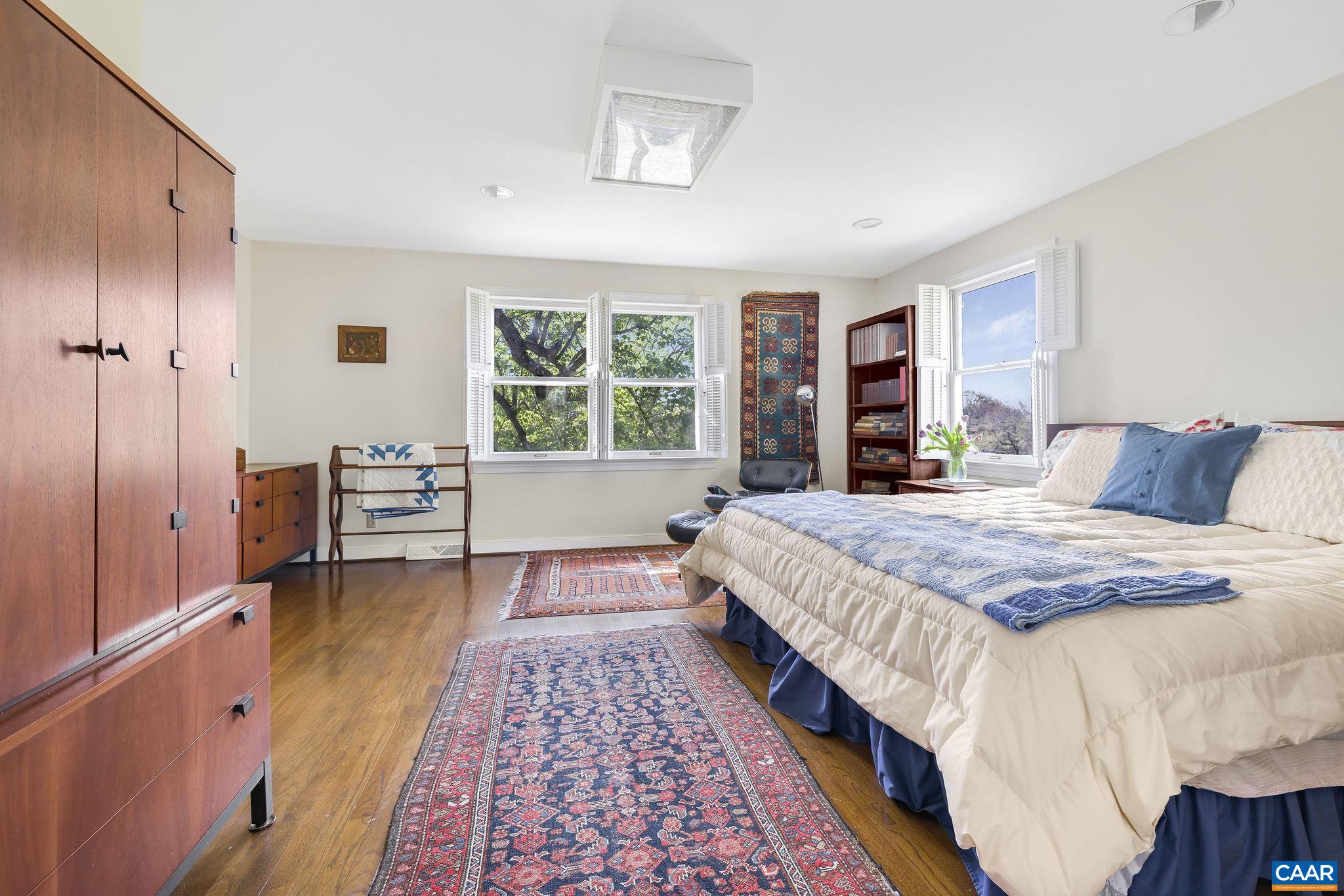 2176 Lindsay Road Gordonsville, VA 22942 - Photo 29 of 70 a spacious bedroom with a bed and a table in it