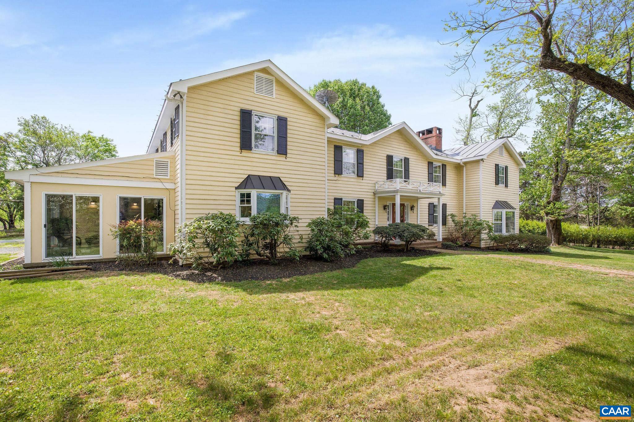 2176 Lindsay Road Gordonsville, VA 22942 - Photo 3 of 70 a front view of a house with a garden