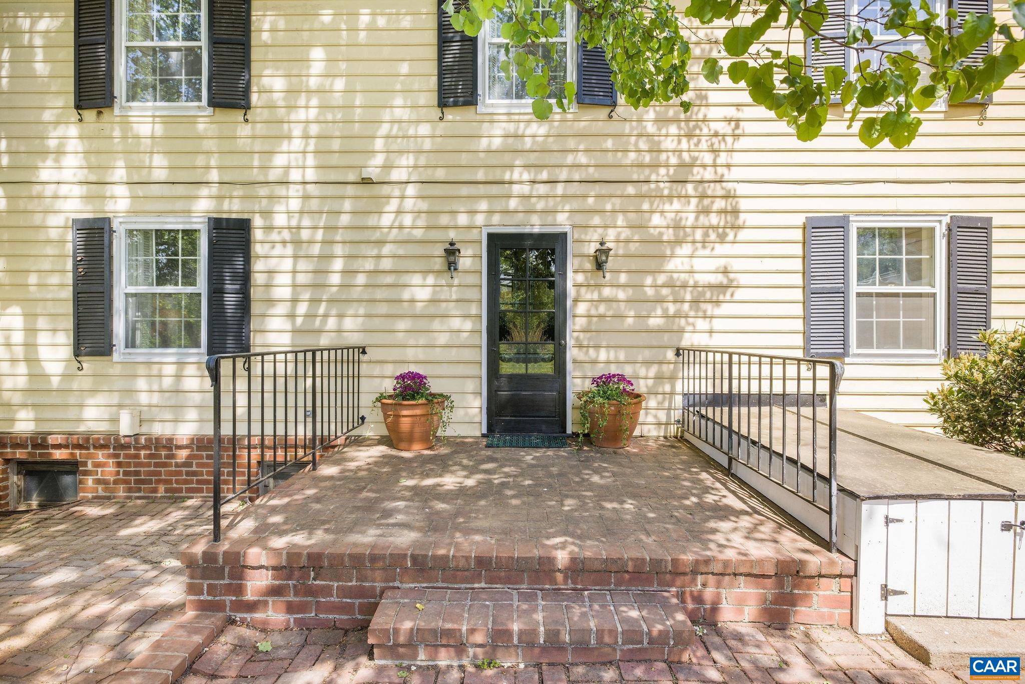 2176 Lindsay Road Gordonsville, VA 22942 - Photo 40 of 70 a view of a brick house with an outdoor space
