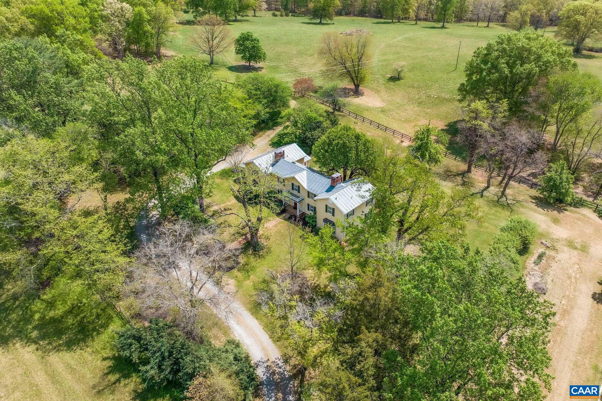 2176 Lindsay Road Gordonsville, VA 22942 - Photo 4 of 70 a view of a lake with a yard