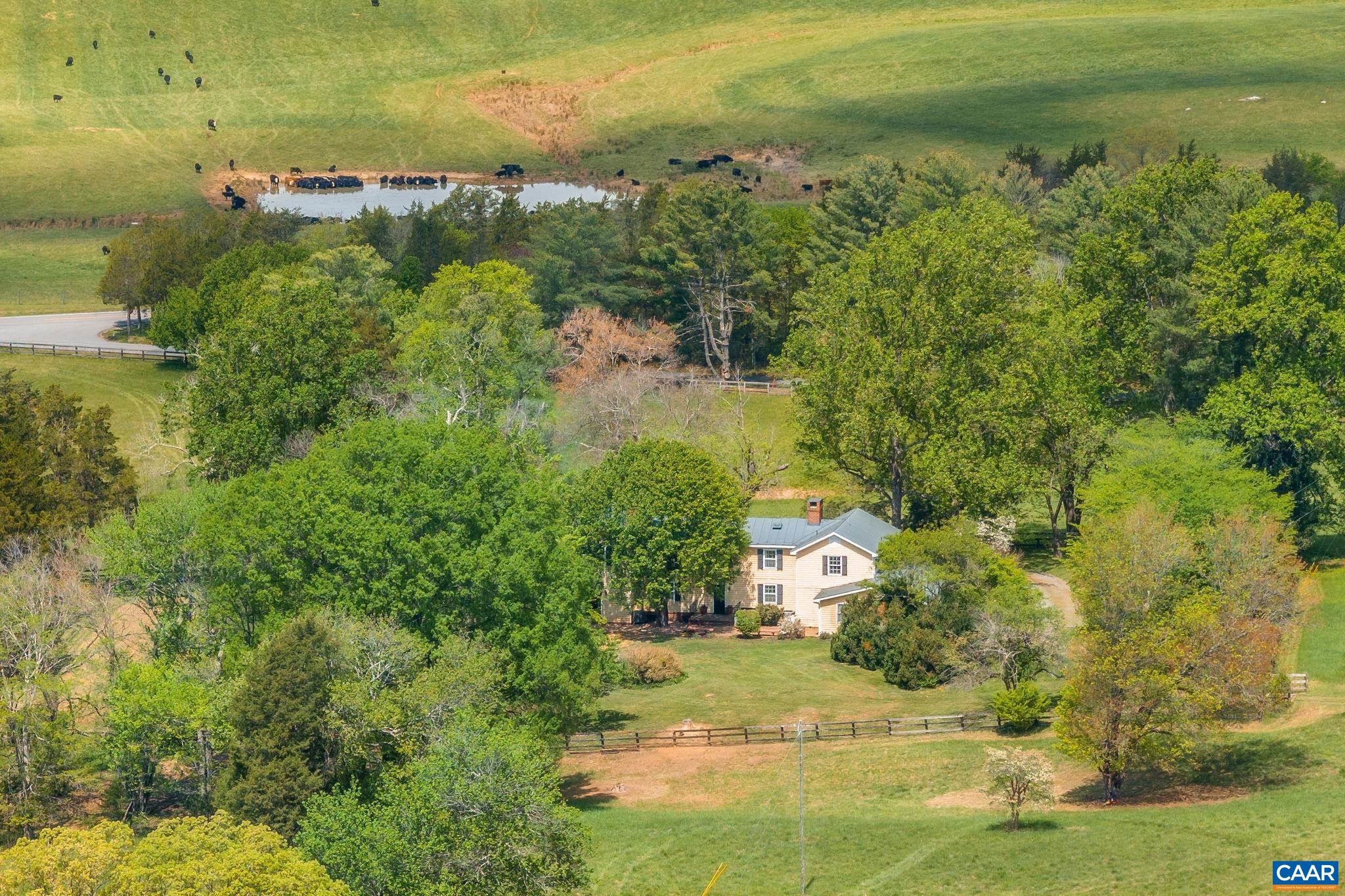 2176 Lindsay Road Gordonsville, VA 22942 - Photo 60 of 70 a view of a lake with a yard