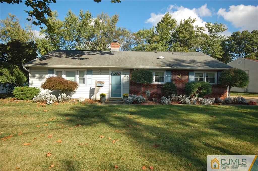 33 Stony Road Edison, NJ 08817 - Photo 1 of 25 a front view of a house with garden