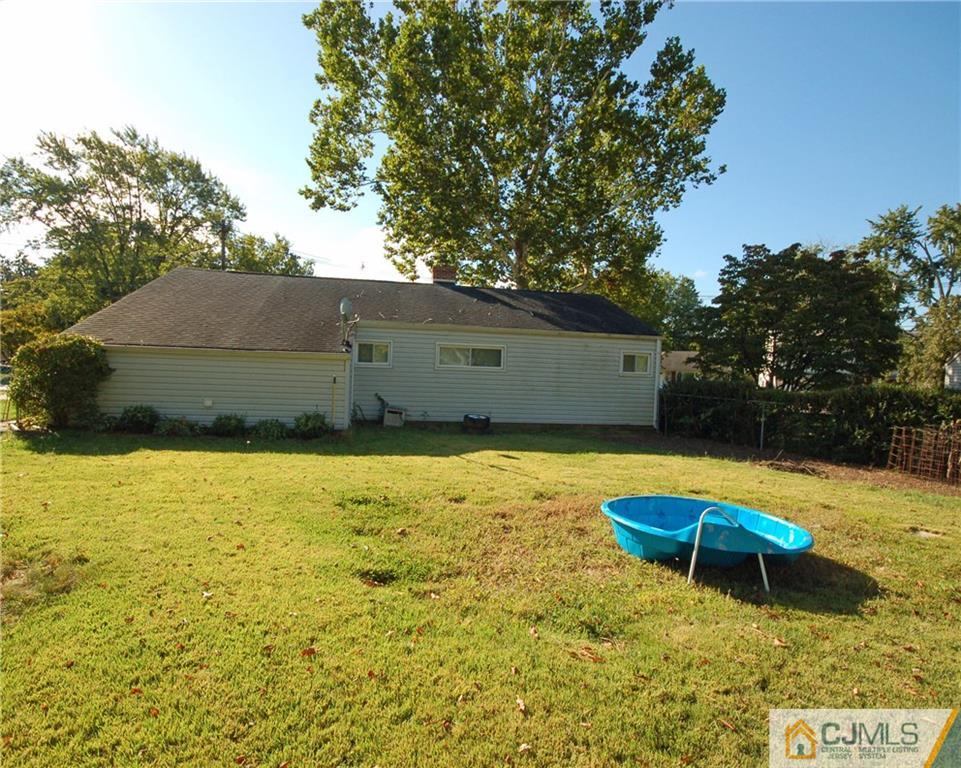 33 Stony Road Edison, NJ 08817 - Photo 22 of 25 a view of a swimming pool with an outdoor space