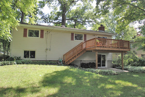 314 Dunbar Road Mundelein, IL 60060 - Photo 17 of 17 a house that has a tree in front of it