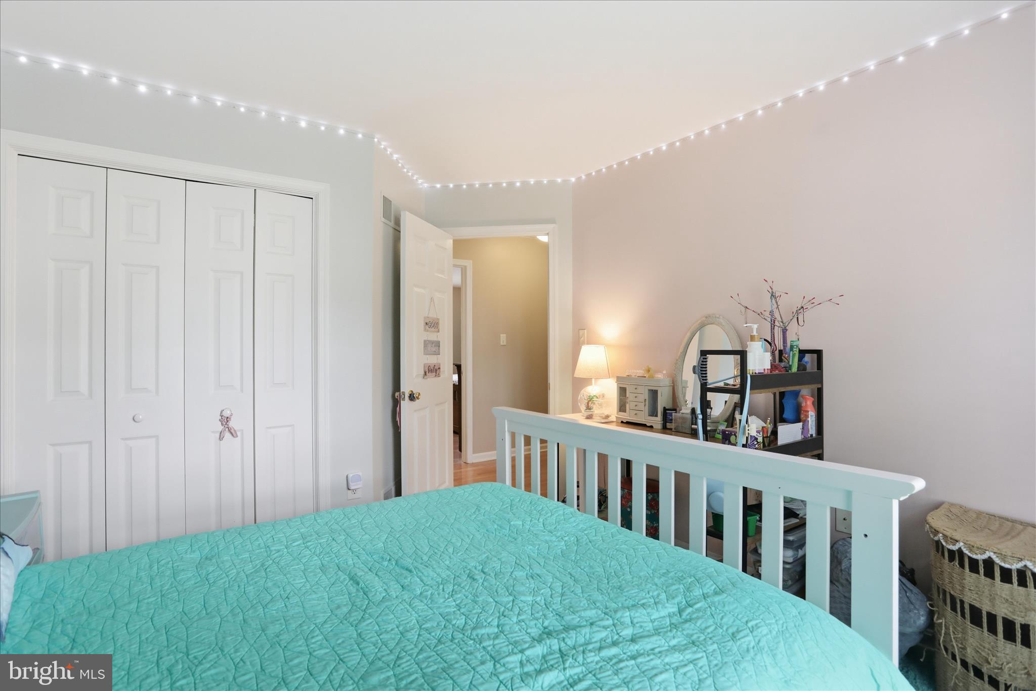 96 Phoenix Lane Falling Waters, WV 25419 - Photo 22 of 37 a view of a bedroom with furniture and staircase