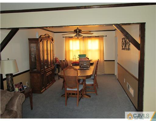 120 South Cliff Road Colonia, NJ 07067 - Photo 3 of 13 a dining room with furniture and window