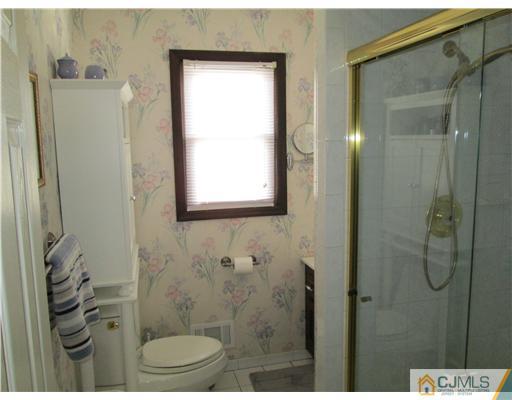 120 South Cliff Road Colonia, NJ 07067 - Photo 7 of 13 a bathroom with a shower