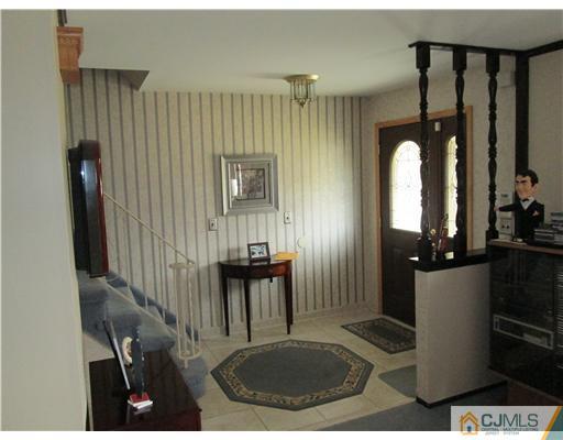 120 South Cliff Road Colonia, NJ 07067 - Photo 10 of 13 a view of a livingroom with furniture and window