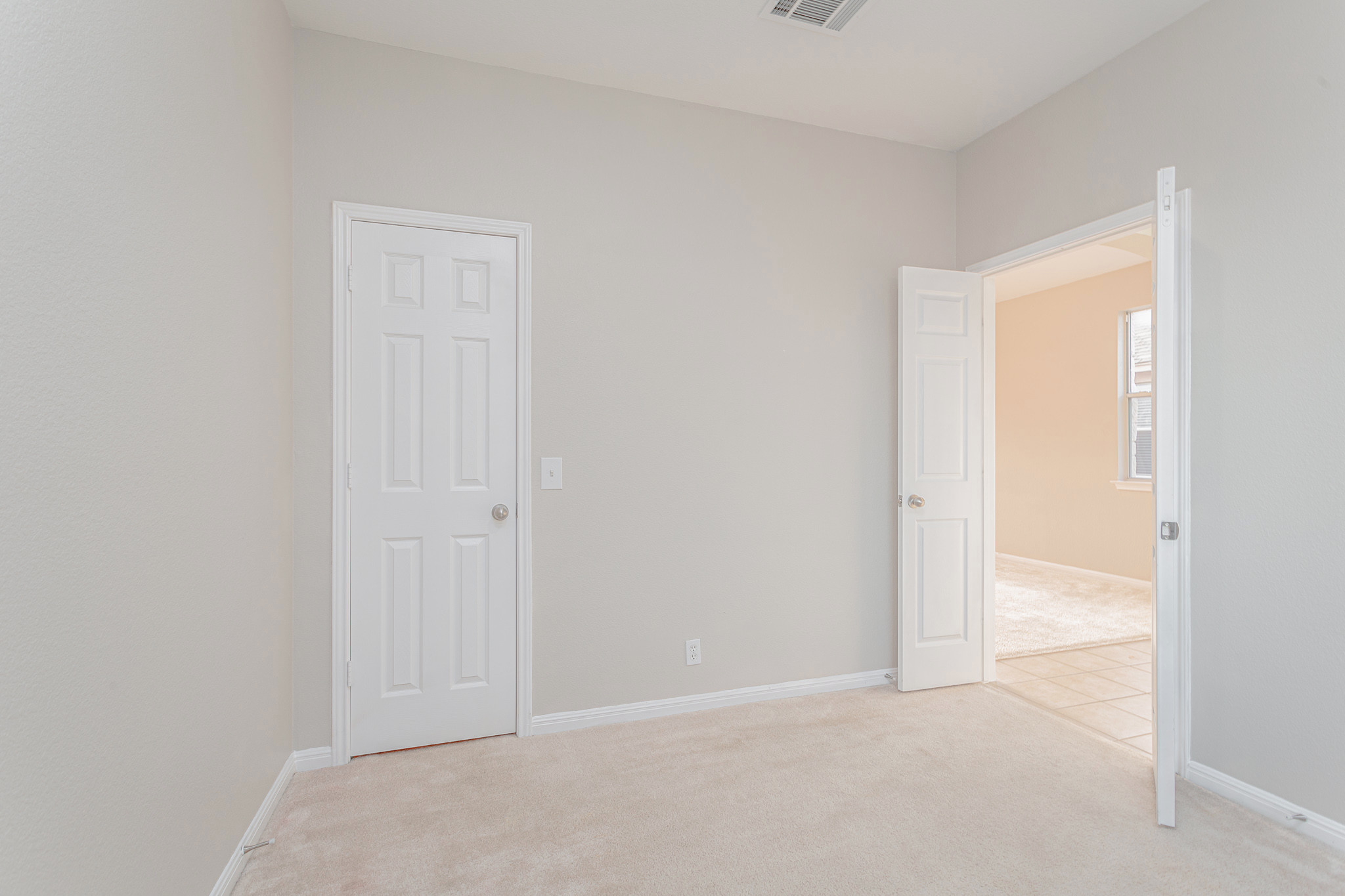 19201 Mangan Way Pflugerville, TX 78660 - Photo 20 of 29 Empty room featuring light carpet