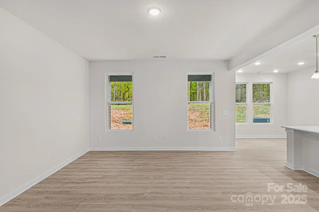 an empty room with windows