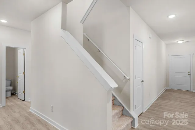 a view of entryway with stairs