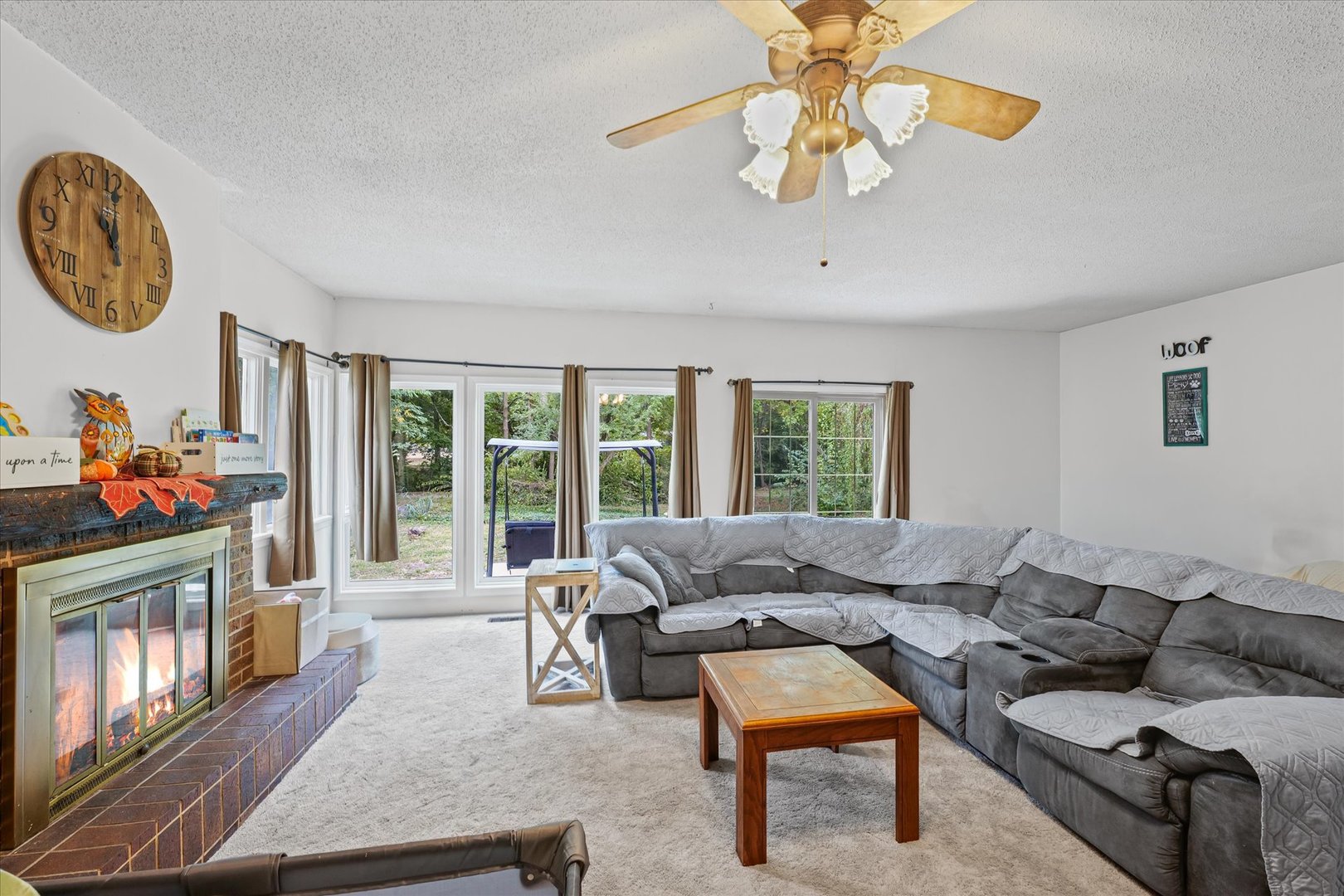 2013 Southwood Drive Champaign, IL 61821 - Photo 16 of 31 a living room with furniture and a large window
