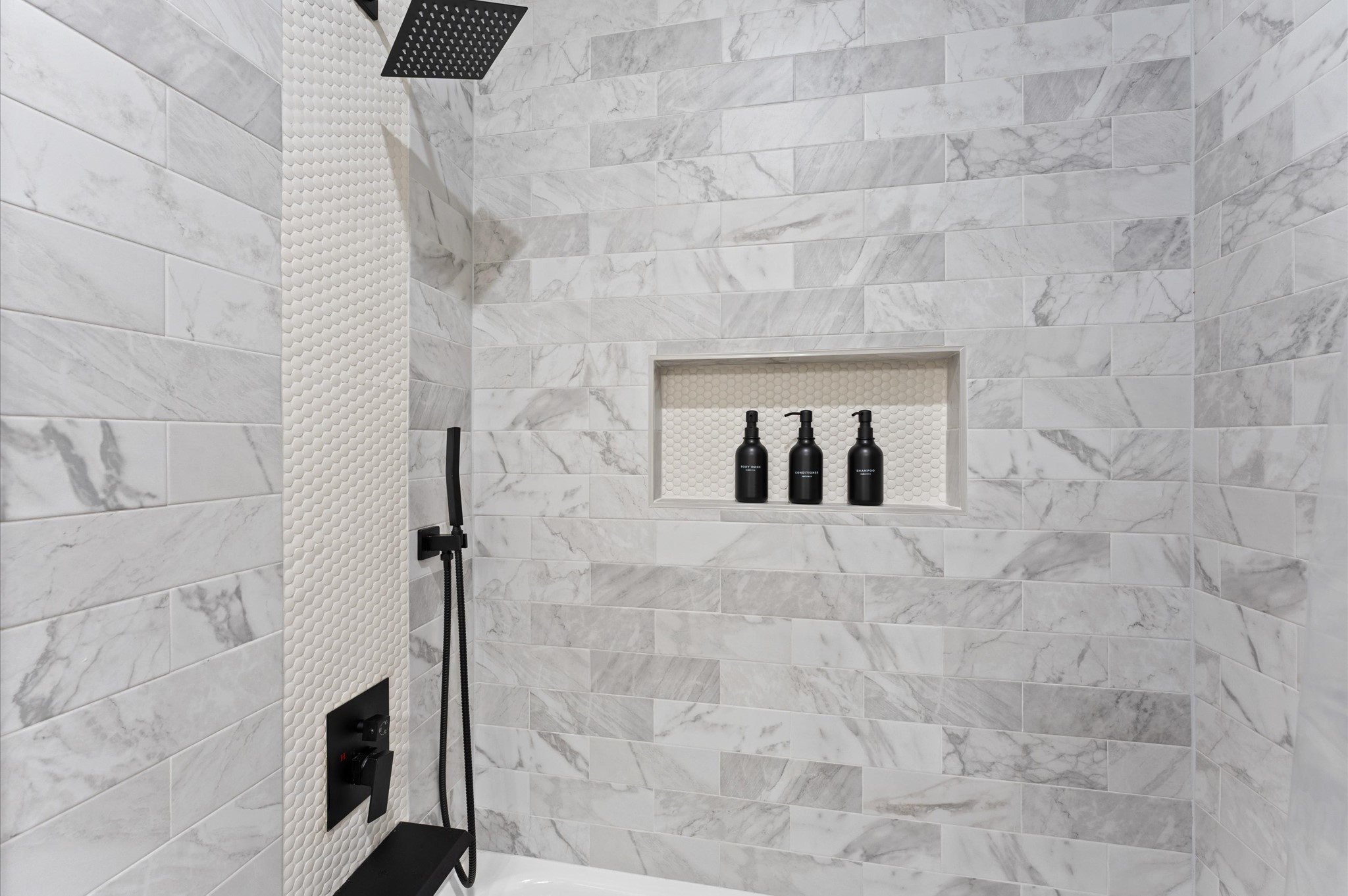 6904 Covington Drive, Unit B Houston, TX 77091 - Photo 27 of 47 a bathroom with a shower