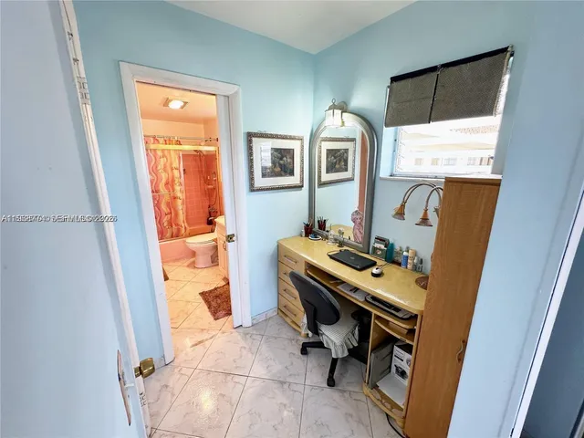 a room with furniture and a window