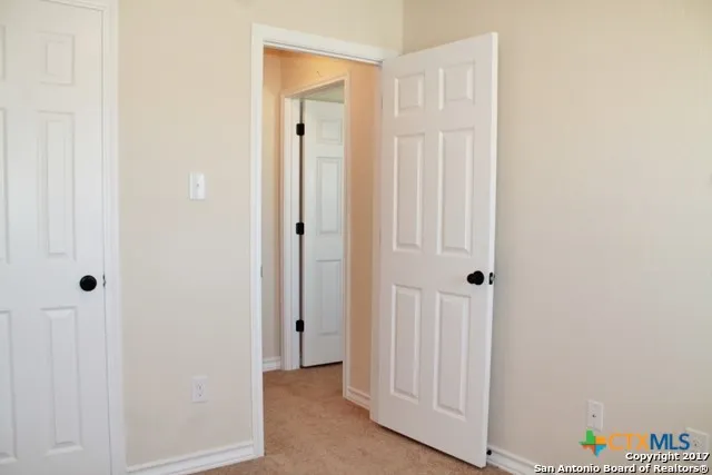 a bathroom with a toilet a sink and bathtub