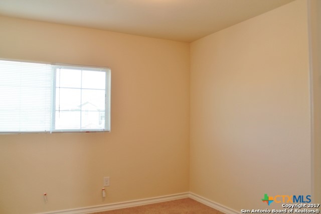 16845 Showdown Path, Unit 2 Selma, TX 78154 - Photo 14 of 16 a small space with a window