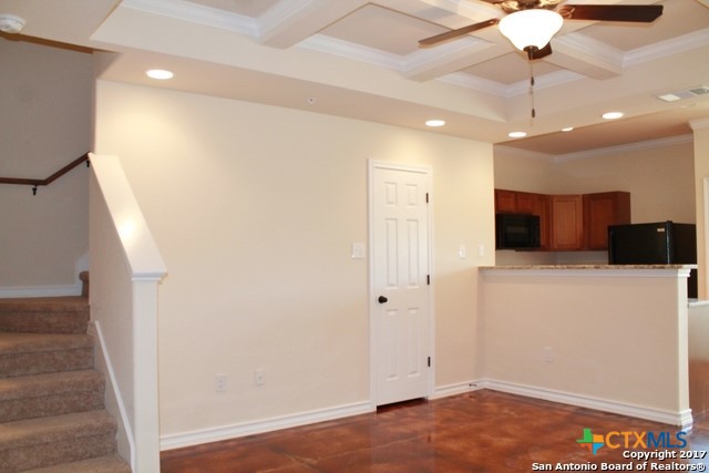 16845 Showdown Path, Unit 2 Selma, TX 78154 - Photo 4 of 16 a view of a room with a flat screen tv