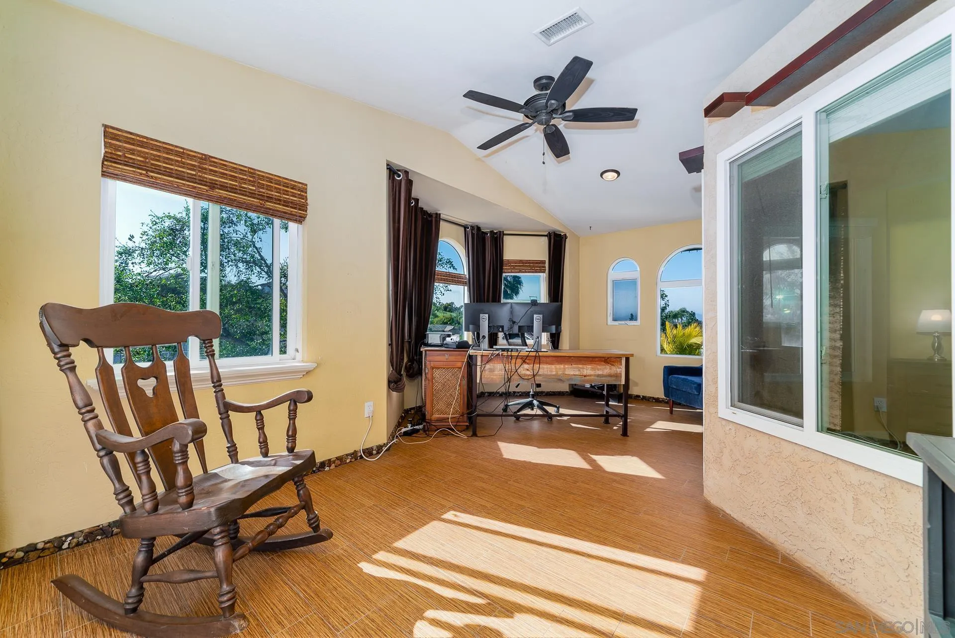 5268 Champlain Street Oceanside, CA 92056 - Photo 27 of 40 a living room with furniture and a large window
