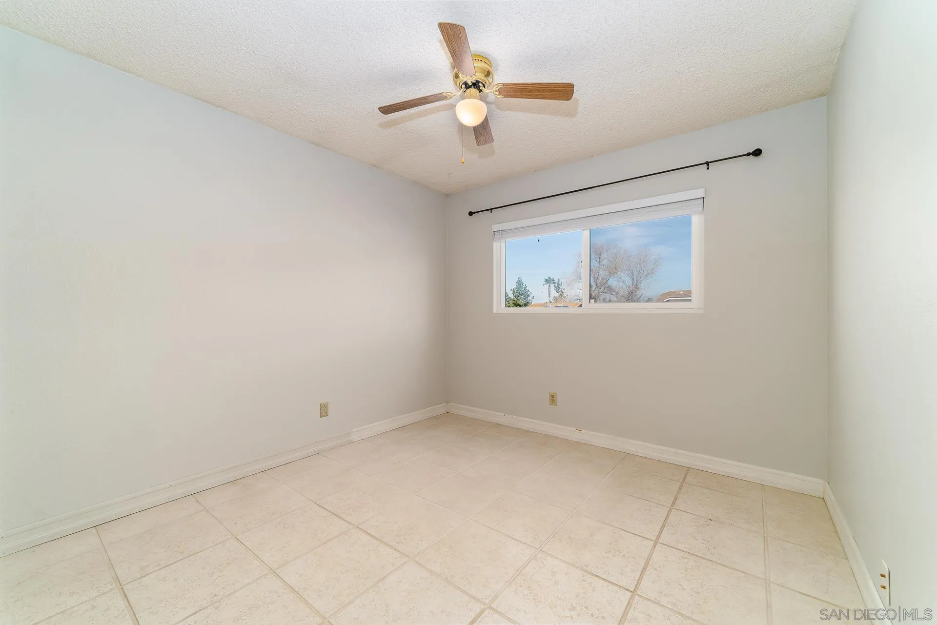 5268 Champlain Street Oceanside, CA 92056 - Photo 31 of 40 wooden floor in an empty room with a window