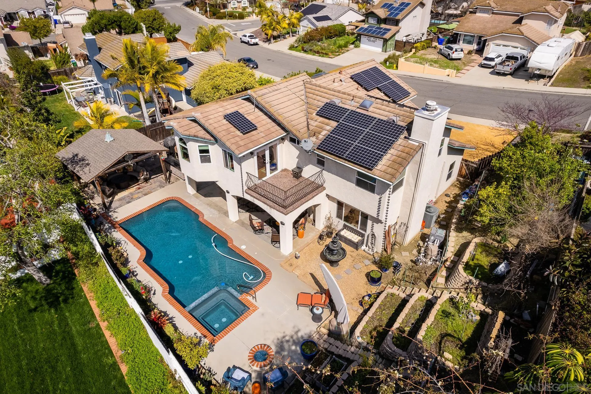 5268 Champlain Street Oceanside, CA 92056 - Photo 39 of 40 an aerial view of a house with a garden and swimming pool
