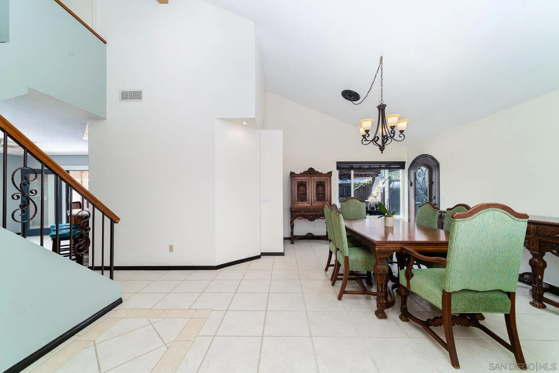 5268 Champlain Street Oceanside, CA 92056 - Photo 7 of 40 a view of a dining room with furniture and wooden floor