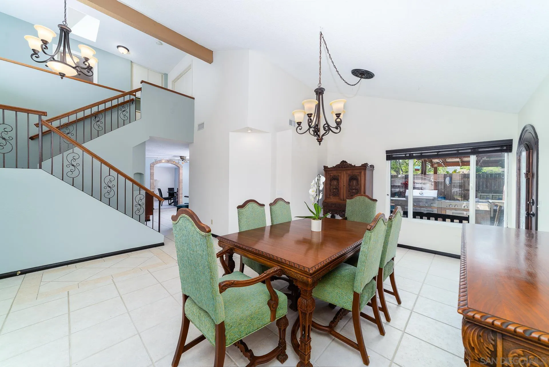 5268 Champlain Street Oceanside, CA 92056 - Photo 8 of 40 a view of a dining room with furniture and wooden floor