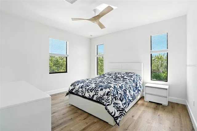 a bathroom with a shower and toilet