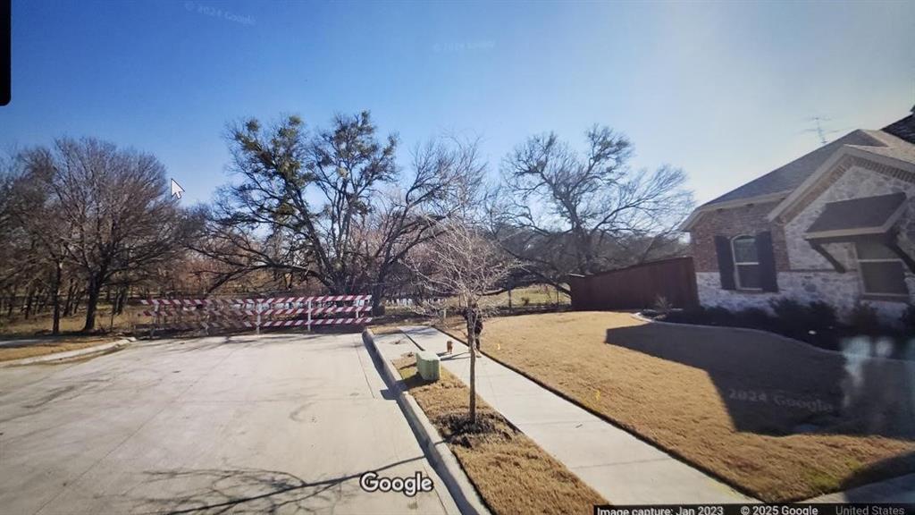 3600 Hickox Road Rowlett, TX 75089 - Photo 2 of 2 a view of a back yard of the house